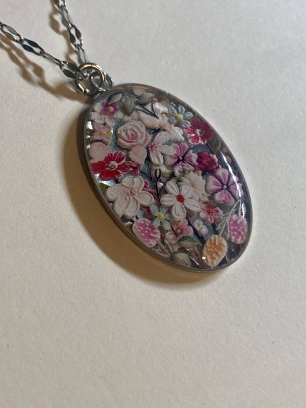 Floral resin pendant necklace.